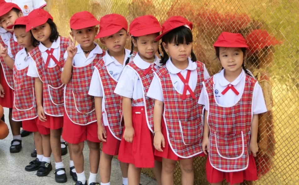 Local kids visiting the Grand Palace