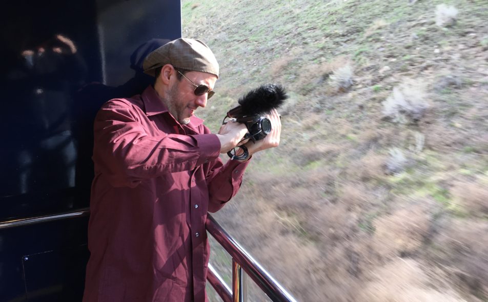 My pal and videographer Rob unsuccessfully trying to muffle wind noise on the GoldLeaf viewing platform.