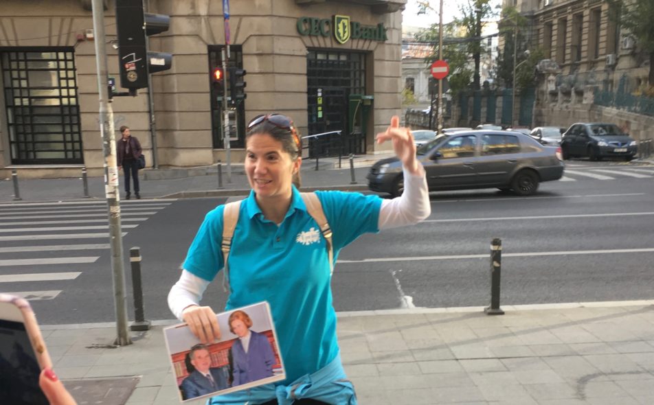 Our wonderful tour guide Elena, holding a photo of Nicolae Ceausescu and his wife, also named Elena.